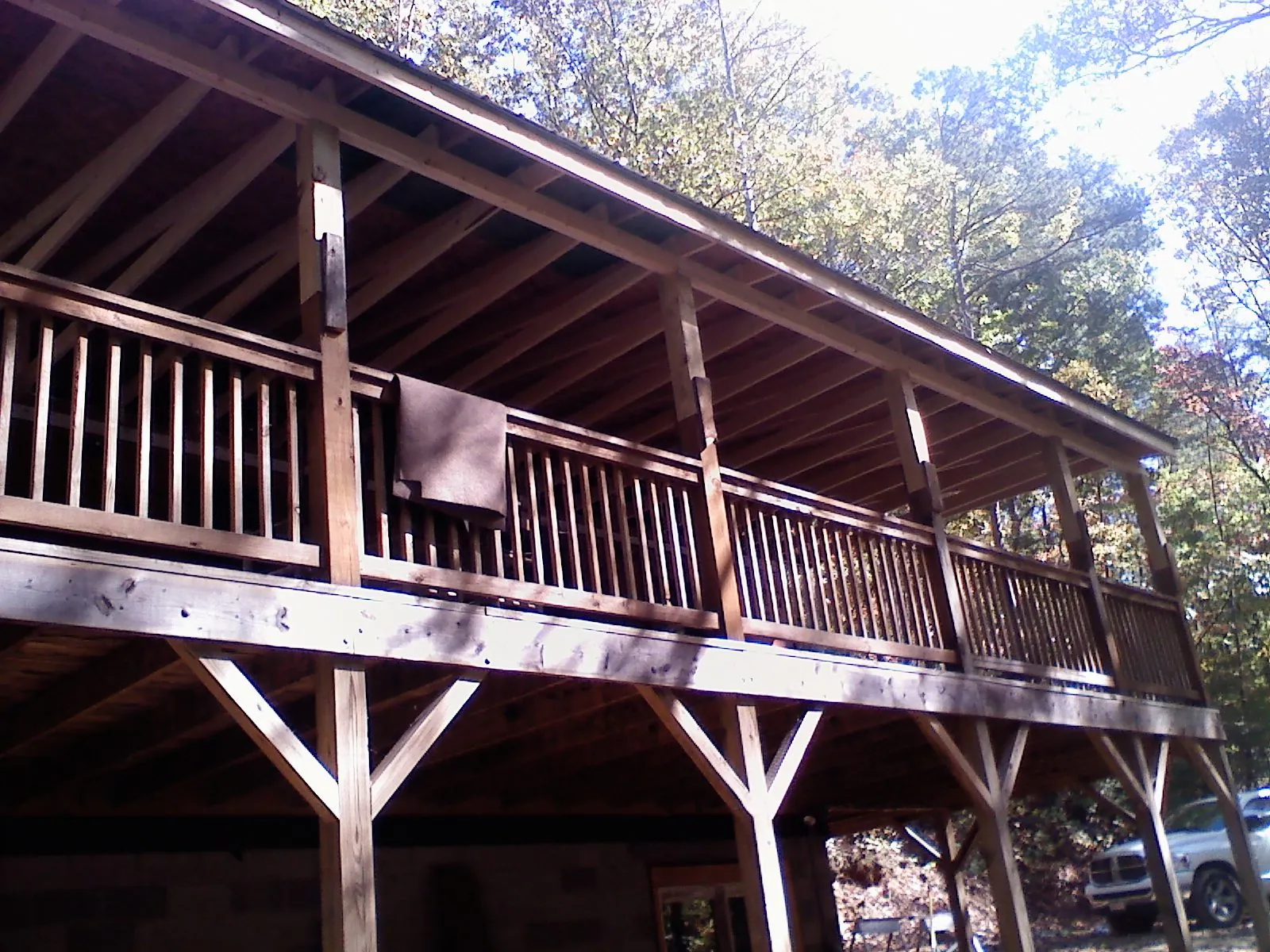 Timber framing under a new elevated porch and deck — Roof Leak Repair in Tenafly by Roofing Brothers