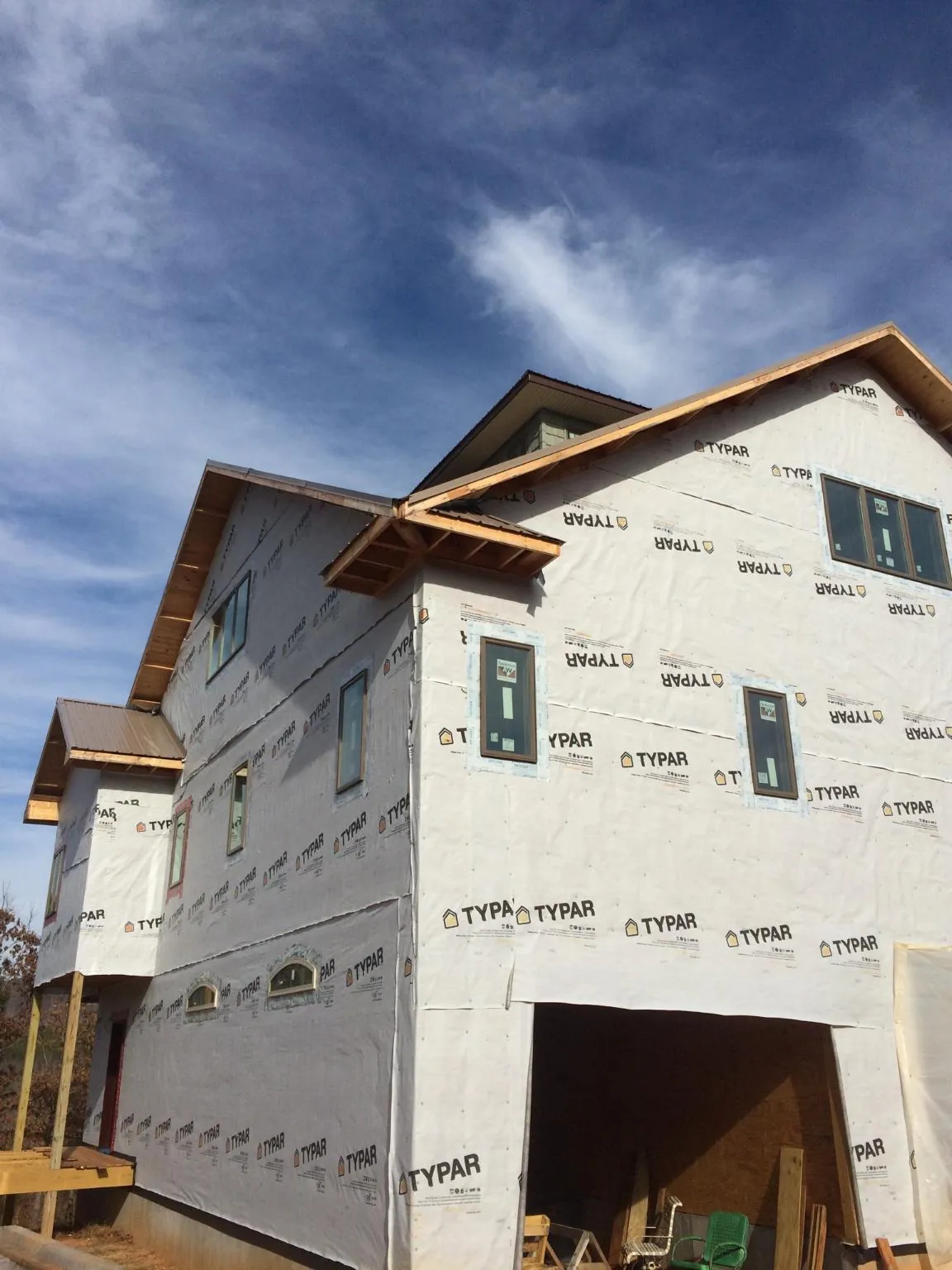 Stick built house wrapped in Typar with new roof framing and dormers in Tenafly
